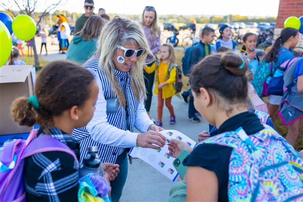 Students walking to school for National Walk to School Day.